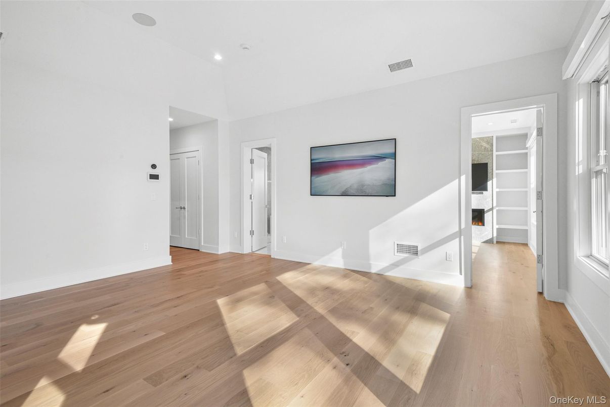 Empty room, Fireplace, Interior, Recessed Lighting, Wood Texture Flooring