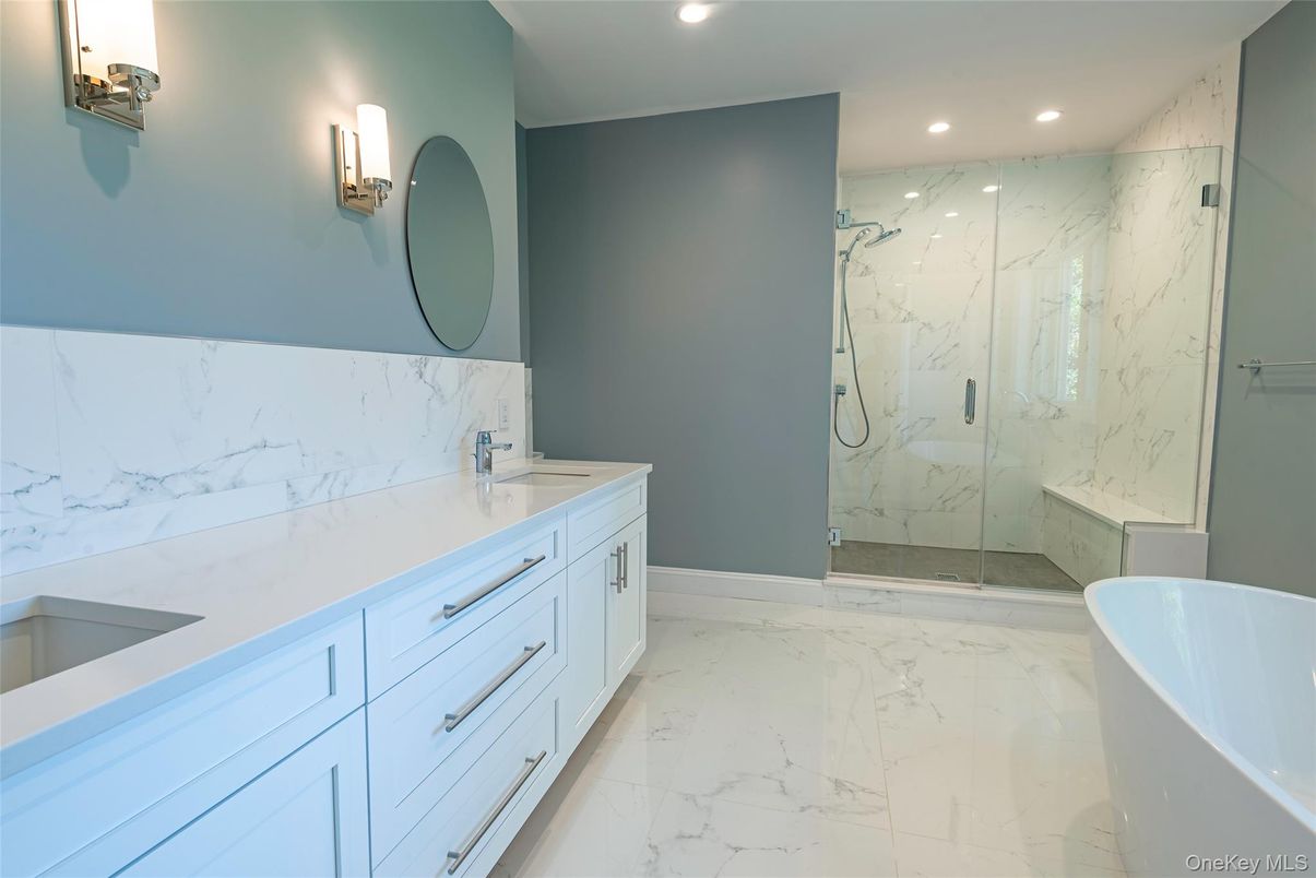 Bathroom, Dual Sink Vanities, Free Standing Baths, Glass Shower, Interior, Marble, Marble Walls, Recessed Lighting