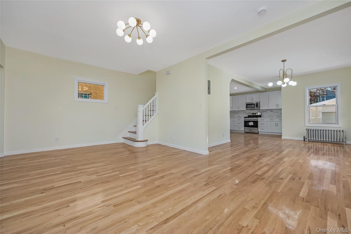 Chandelier, Empty room, Interior, Kitchen, Pendant Lights, Stainless Steel Appliances, Wood Texture Flooring