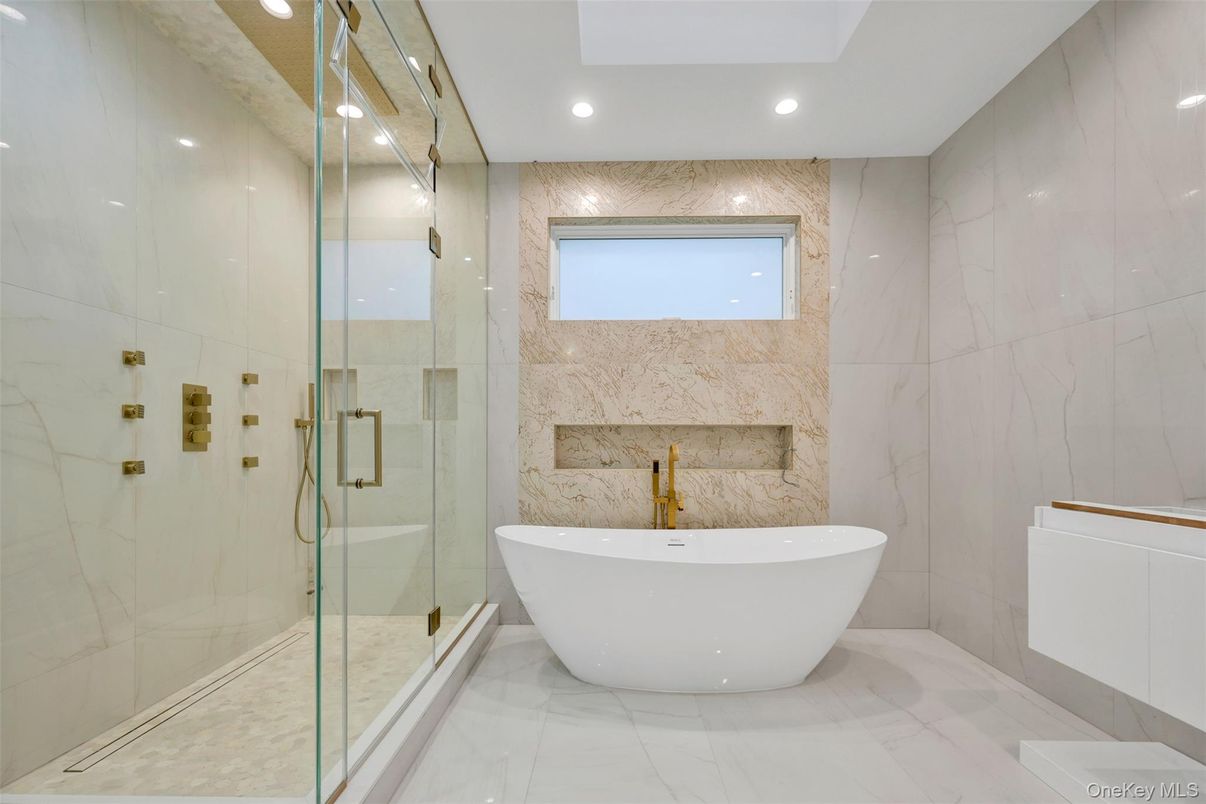 Bathroom, Free Standing Baths, Glass Shower, Interior, Marble Walls, Recessed Lighting