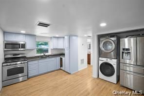 Interior, Kitchen, Recessed Lighting, Stainless Steel Appliances, Washer, Wood Texture Flooring