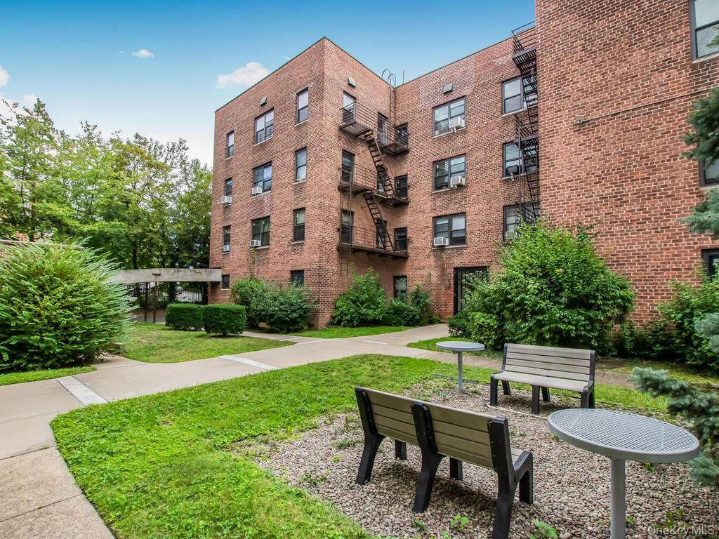 Backyard, Exterior, Facade, Brick Facade, Condo Building