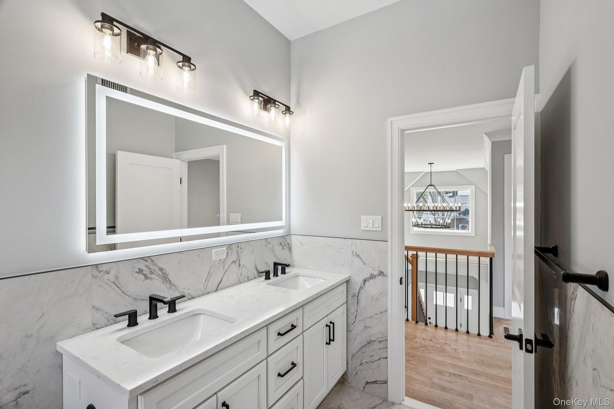 Bathroom, Dual Sink Vanities, Interior, Marble, Marble Walls, Wood Texture Flooring