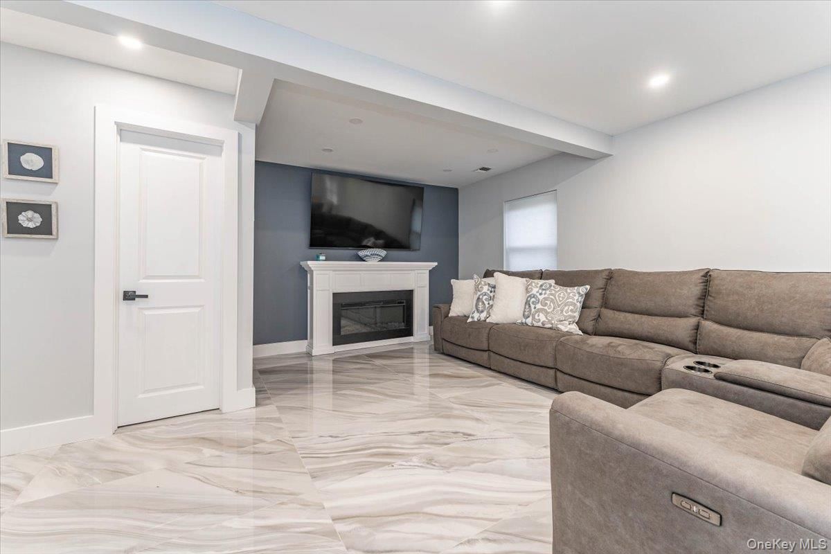 Fireplace, Interior, Living room, Marble, Recessed Lighting