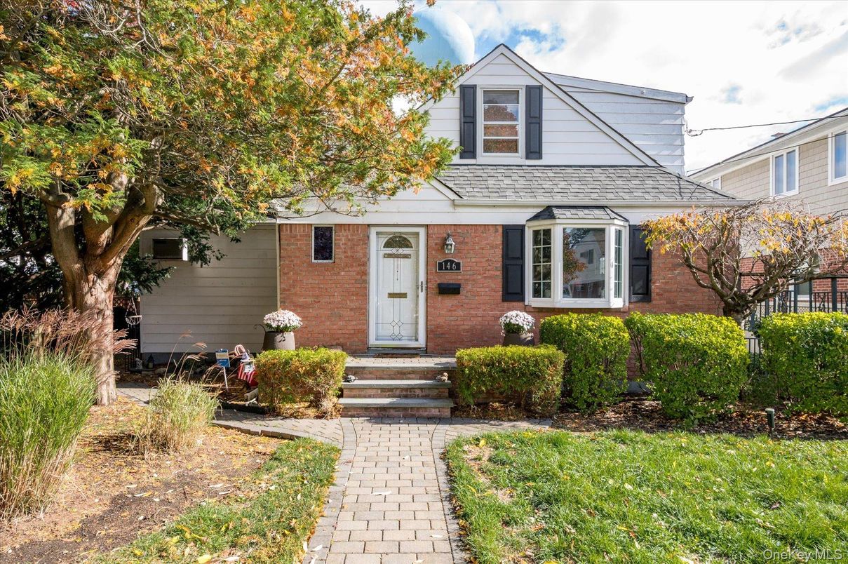 Exterior, Facade, Brick Facade, Cape Cod