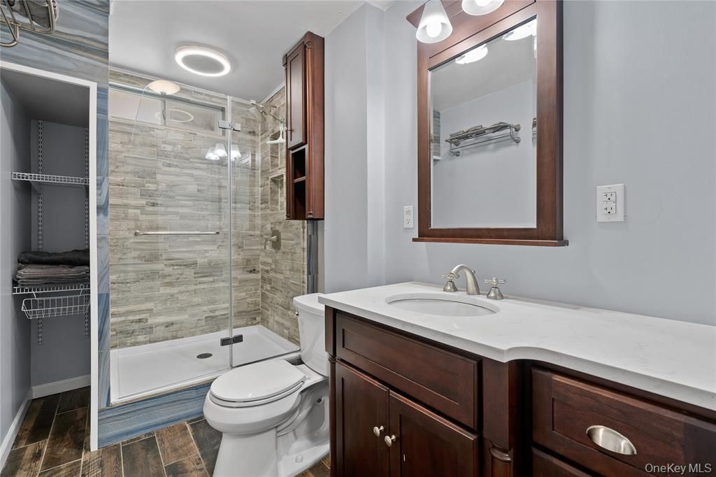 Bathroom, Glass Shower, Interior, Recessed Lighting, Wood Texture Flooring