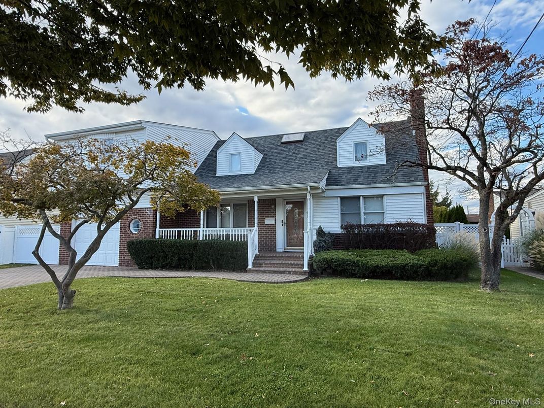 Exterior, Facade, Brick Facade, Cape Cod