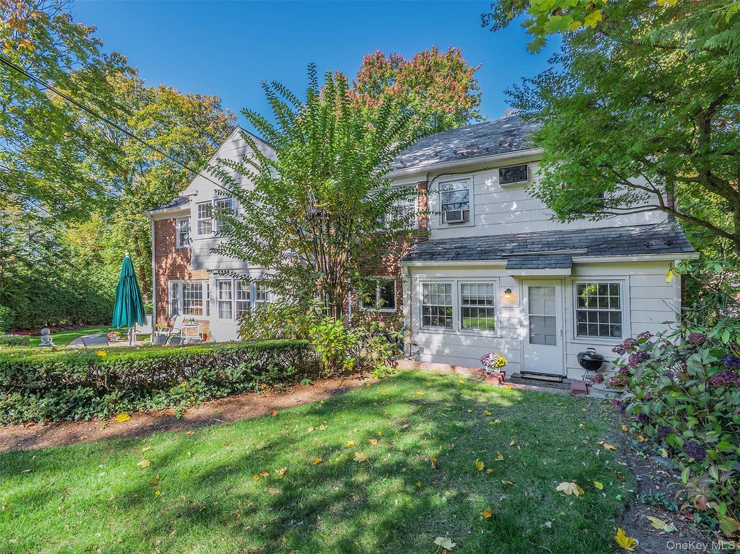 Backyard, Exterior, Facade, Brick Facade, American Foursquare