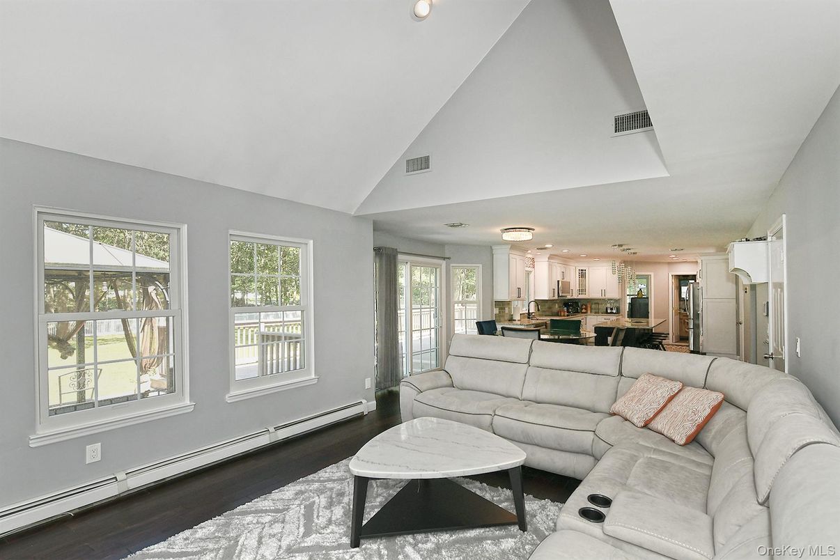 Dining room, Interior, Kitchen, Living room, Recessed Lighting, Stainless Steel Appliances, Wood Texture Flooring