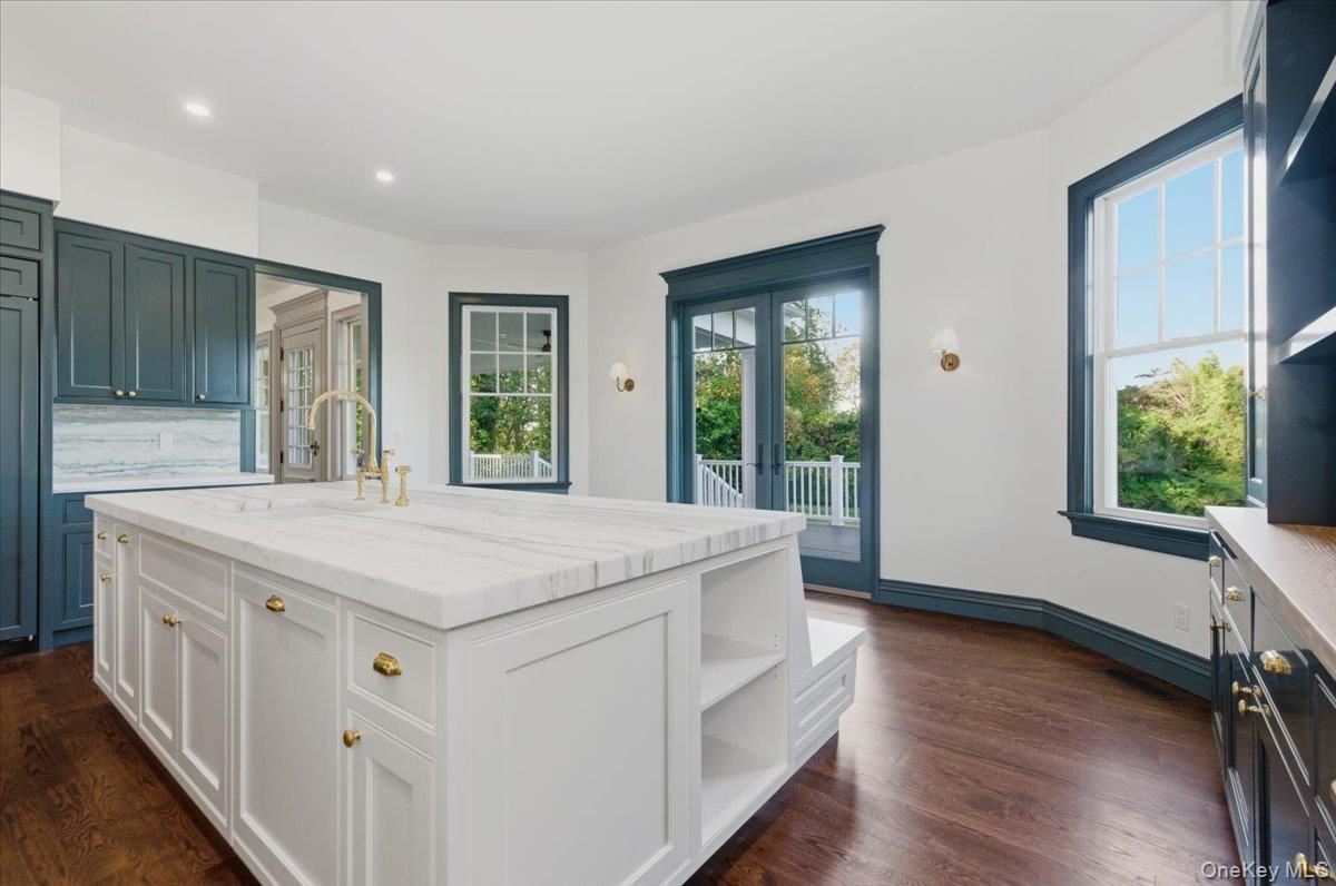 Interior, Kitchen, Recessed Lighting, Tile Countertops, Wood Texture Flooring