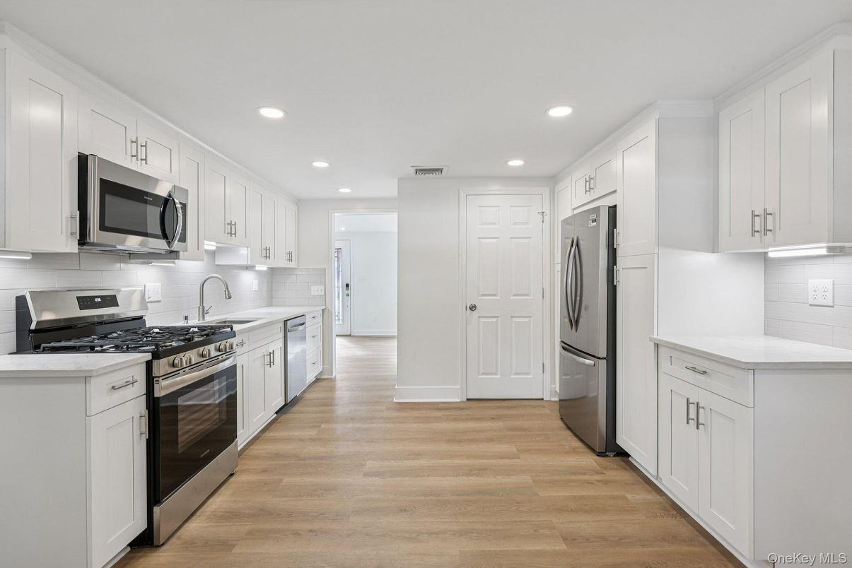 Interior, Kitchen, Recessed Lighting, Stainless Steel Appliances, Wood Texture Flooring