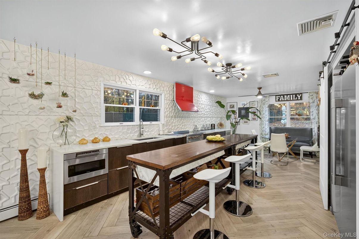 Dining room, Interior, Kitchen, Recessed Lighting, Stainless Steel Appliances, Wood Texture Flooring