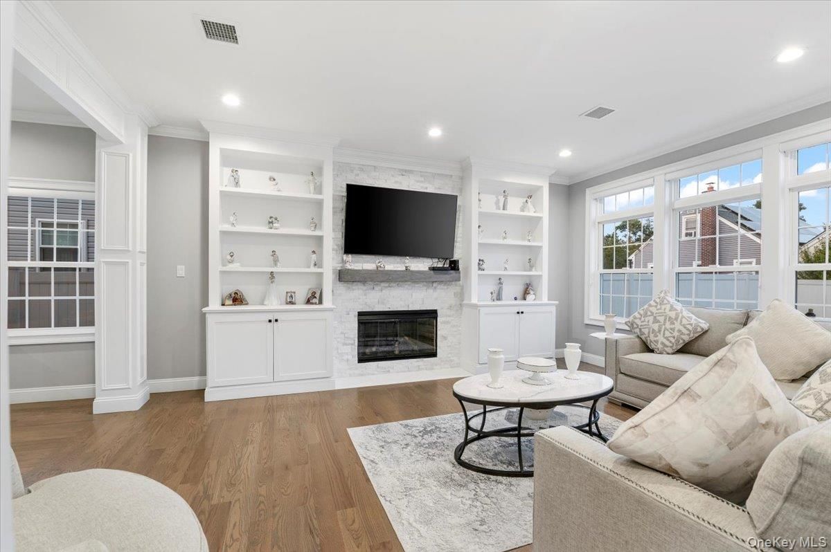 Fireplace, Interior, Living room, Recessed Lighting, Wood Texture Flooring