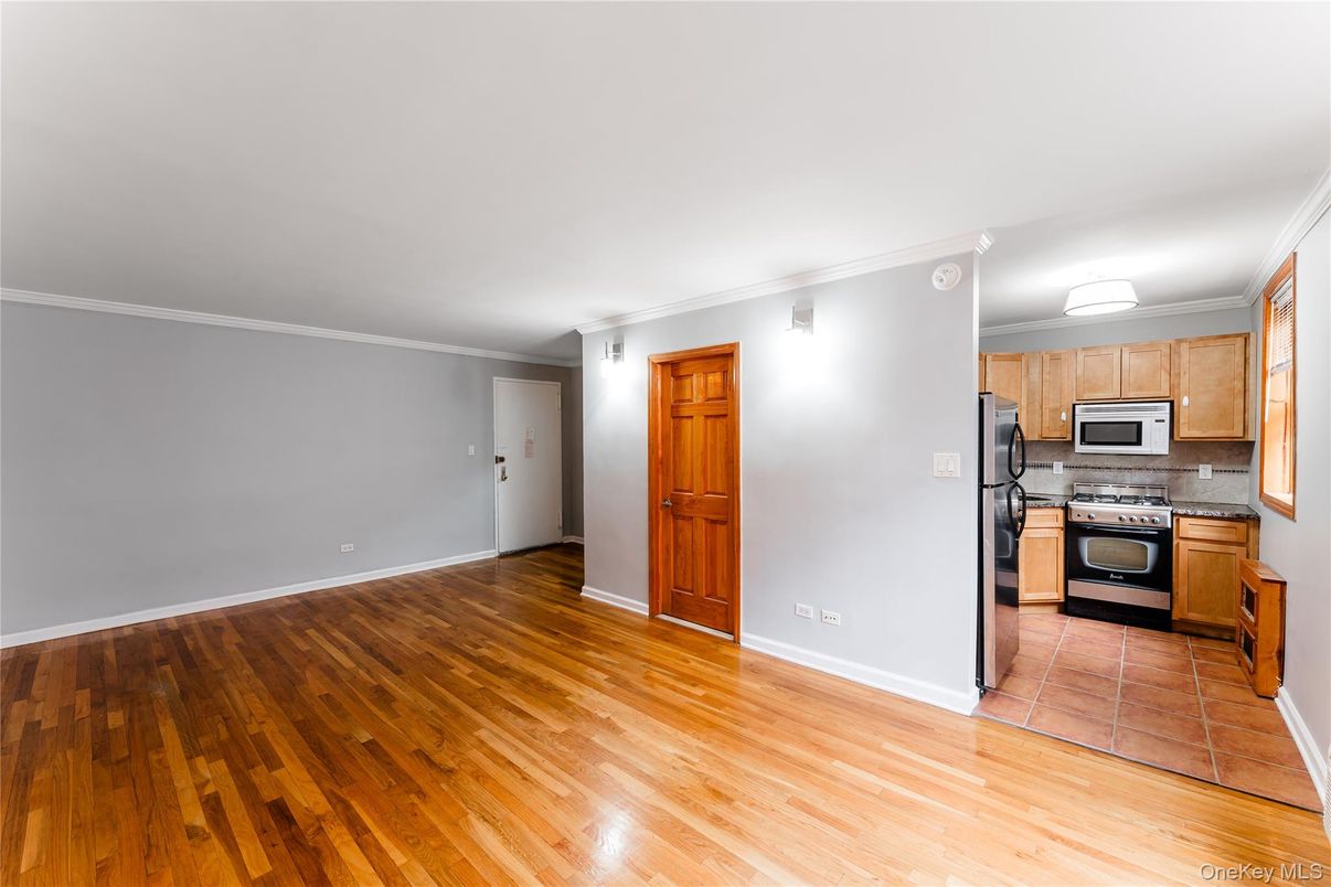 Empty room, Interior, Kitchen, Stainless Steel Appliances, Wood Texture Flooring