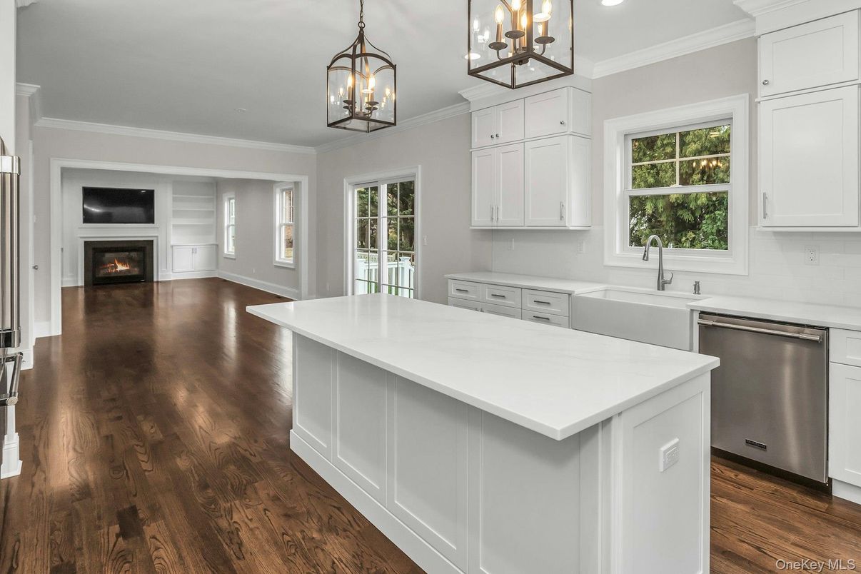 Fireplace, Interior, Kitchen, Pendant Lights, Recessed Lighting, Stainless Steel Appliances, Wood Texture Flooring