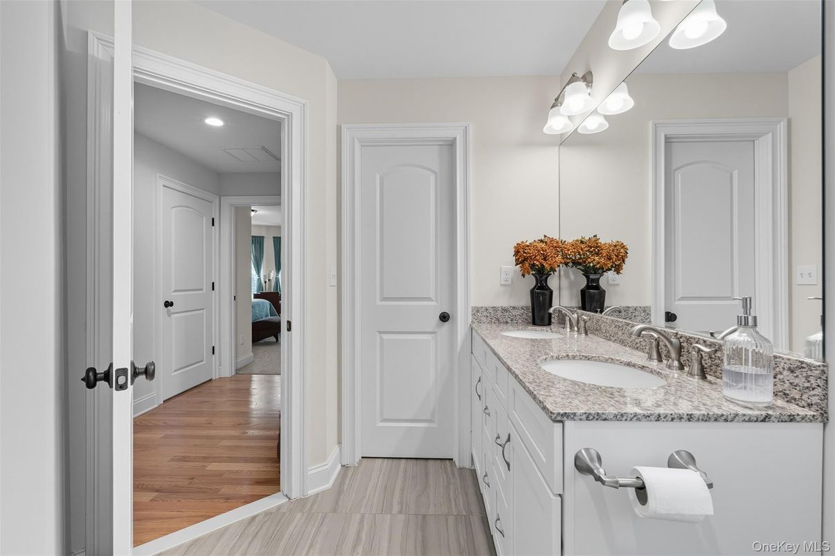 Bathroom, Dual Sink Vanities, Interior, Recessed Lighting, Wood Texture Flooring