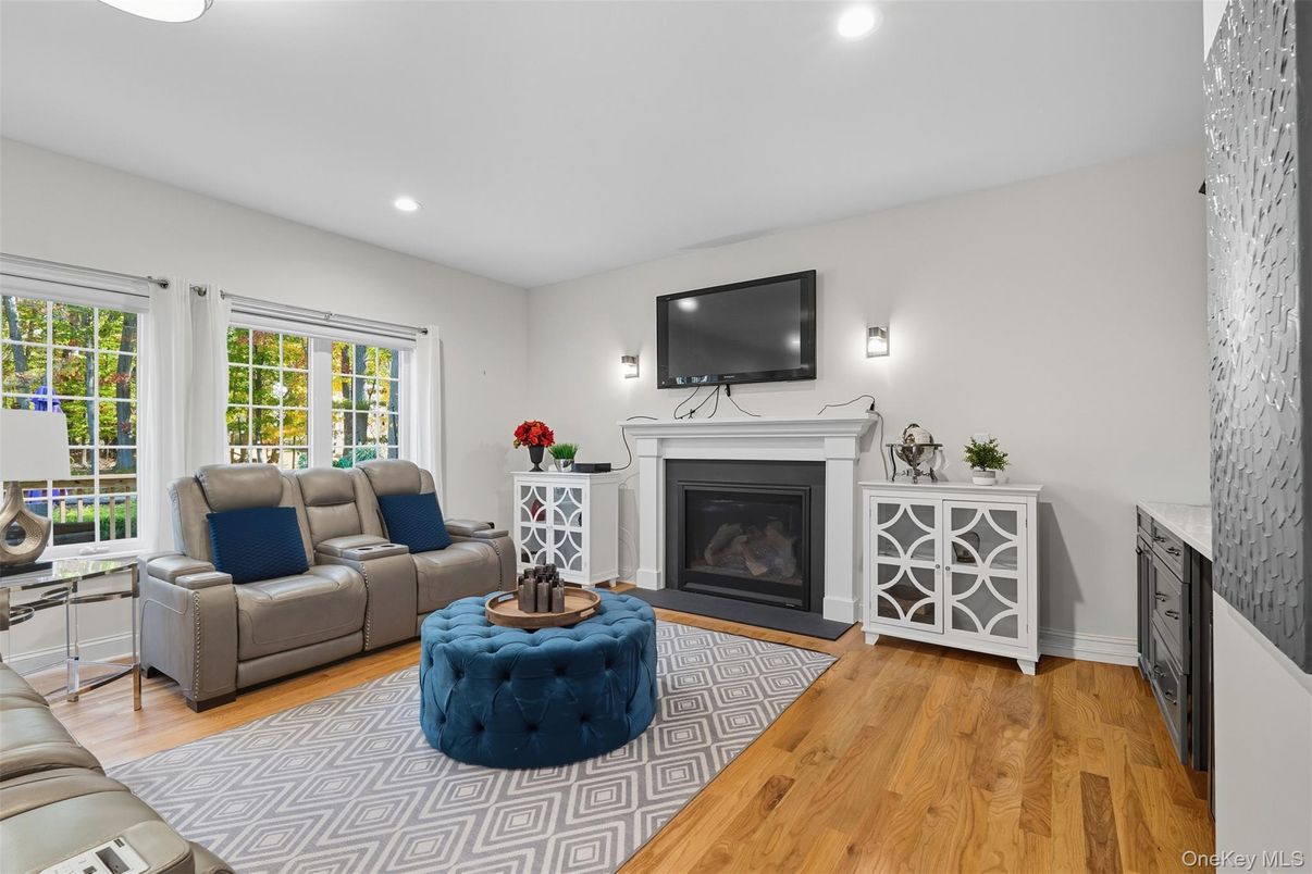 Fireplace, Interior, Living room, Recessed Lighting, Wood Texture Flooring