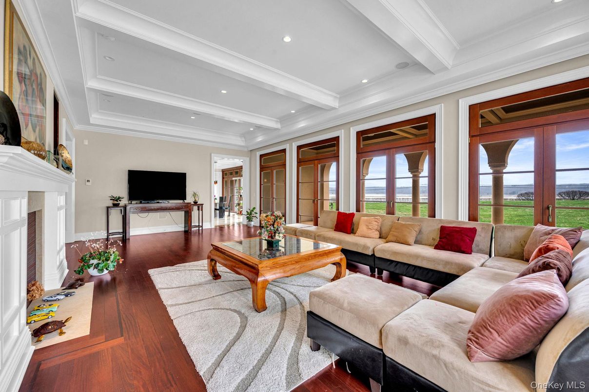 Fireplace, Interior, Living room, Recessed Lighting, Water, Wood Texture Flooring