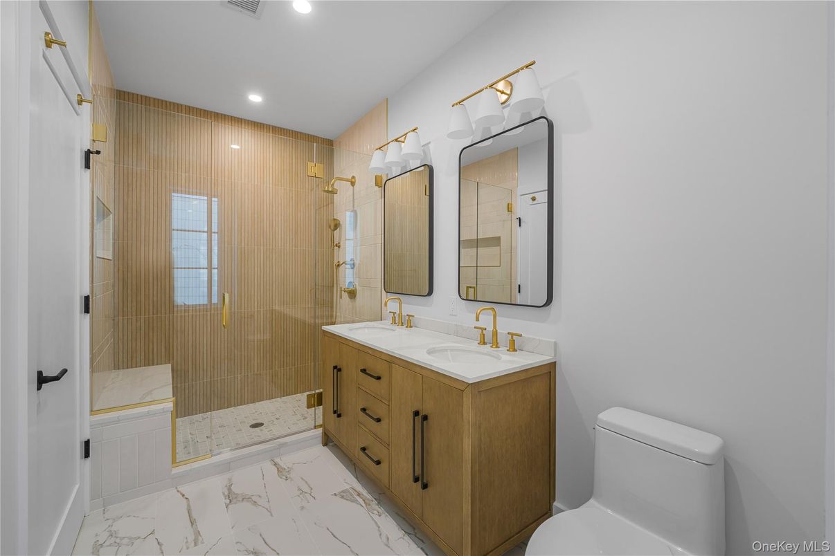 Bathroom, Dual Sink Vanities, Glass Shower, Interior, Marble, Recessed Lighting