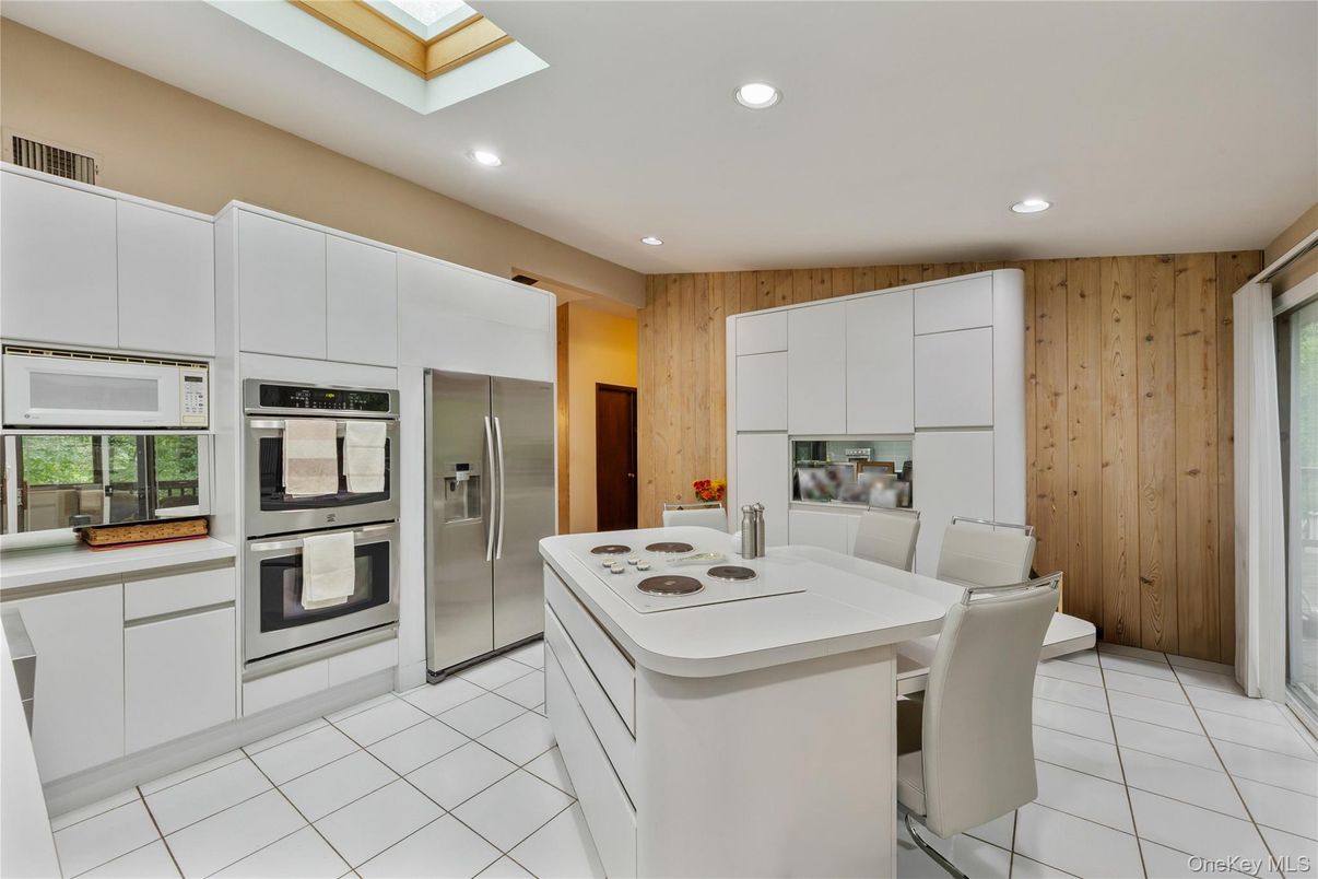 Dining room, Interior, Kitchen, Recessed Lighting, Stainless Steel Appliances, Wooden Walls
