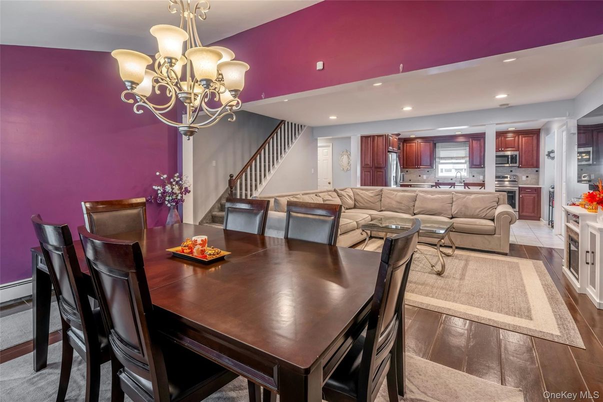 Chandelier, Dining room, Interior, Kitchen, Living room, Recessed Lighting, Stainless Steel Appliances, Wood Texture Flooring