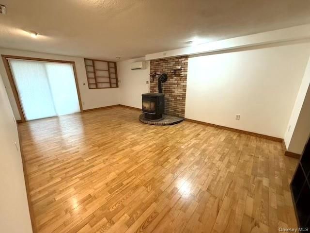 Empty room, Fireplace, Interior, Stone Walls, Wood Texture Flooring