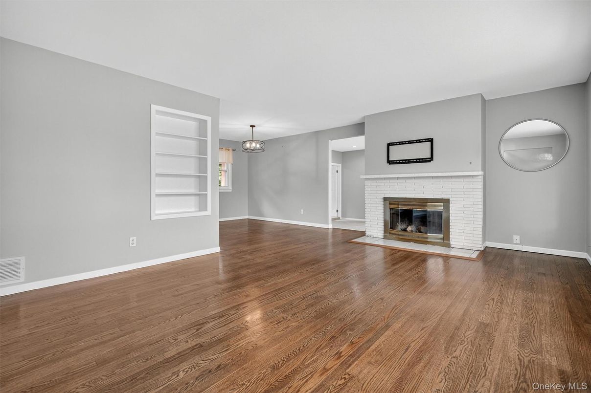 Chandelier, Empty room, Fireplace, Interior, Wood Texture Flooring