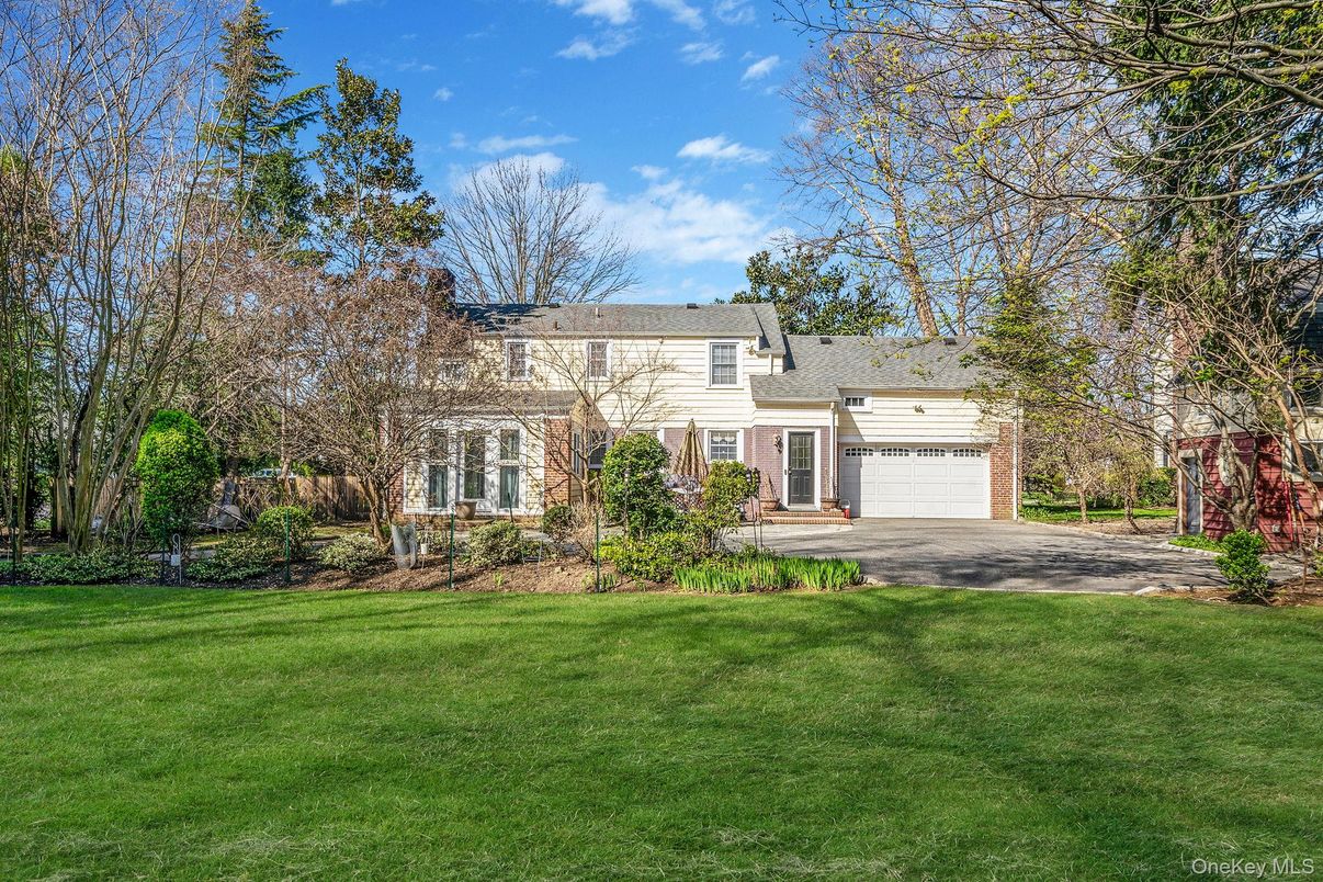 Attached, Backyard, Exterior, Facade, Brick Facade, Cape Cod