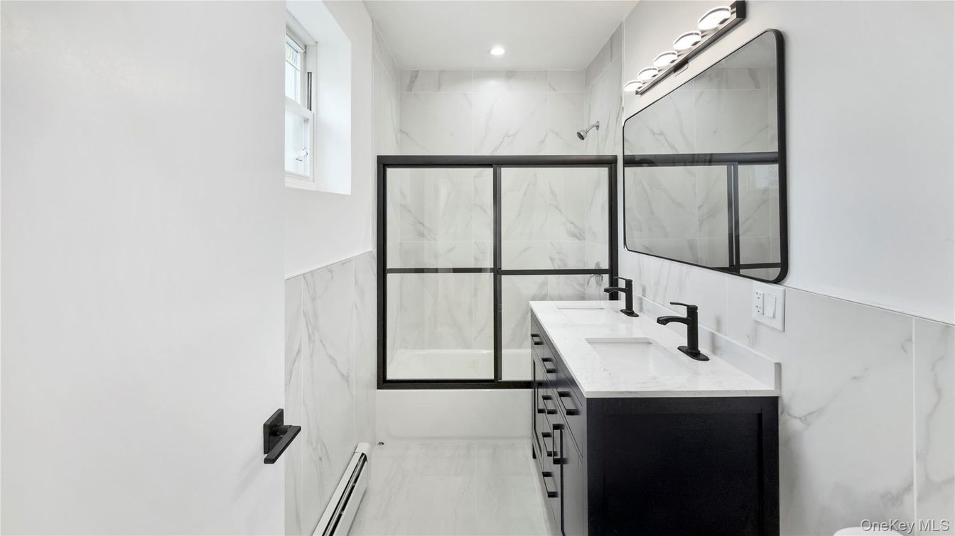 Bathroom, Dual Sink Vanities, Glass Shower, Interior, Marble Walls, Recessed Lighting