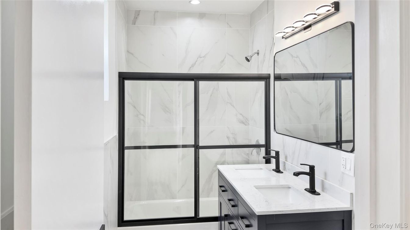 Bathroom, Dual Sink Vanities, Glass Shower, Interior, Marble Walls