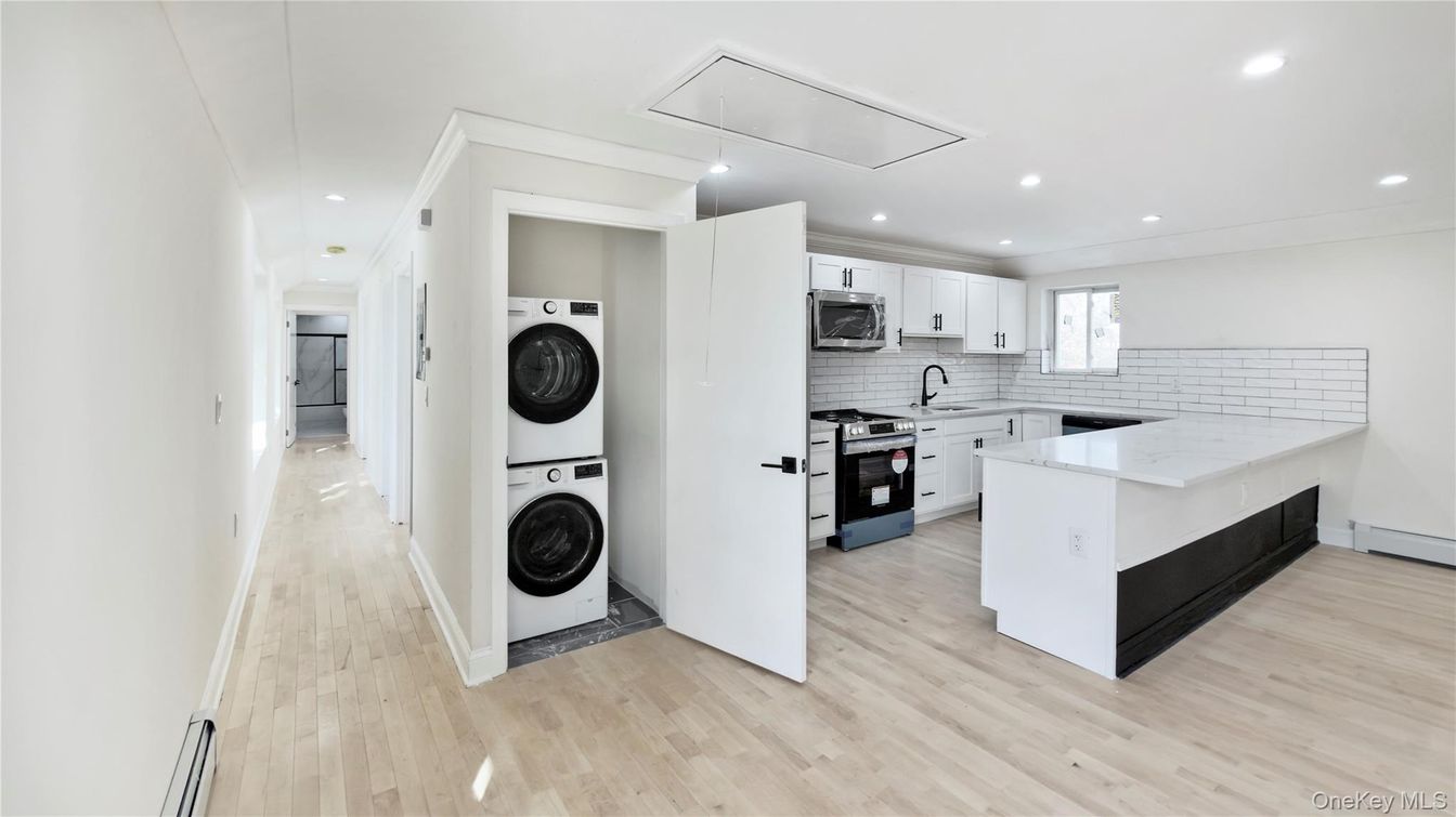 Interior, Kitchen, Recessed Lighting, Washer, Wood Texture Flooring