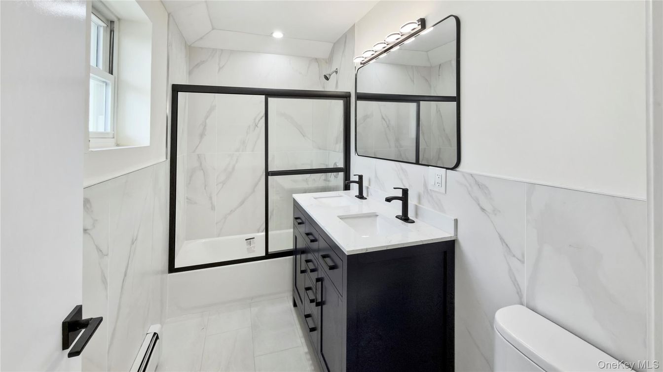 Bathroom, Dual Sink Vanities, Interior, Marble Walls, Recessed Lighting