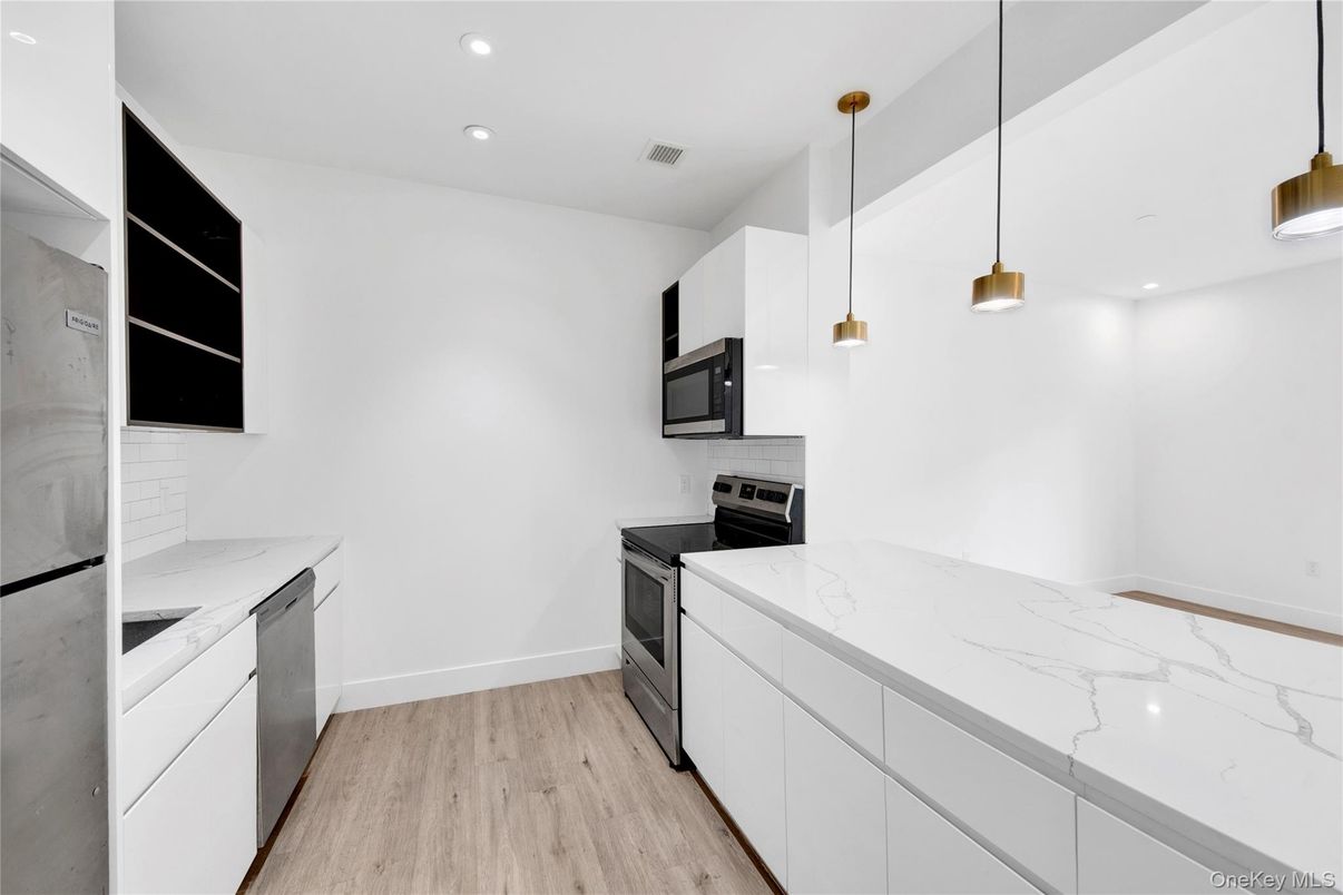 Interior, Kitchen, Pendant Lights, Recessed Lighting, Stainless Steel Appliances, Wood Texture Flooring