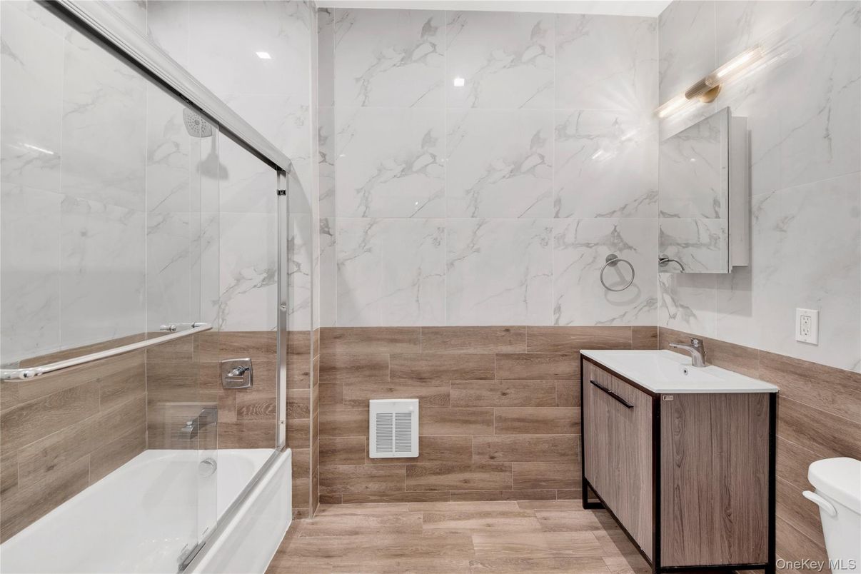 Bathroom, Glass Shower, Interior, Marble Walls, Wood Texture Flooring