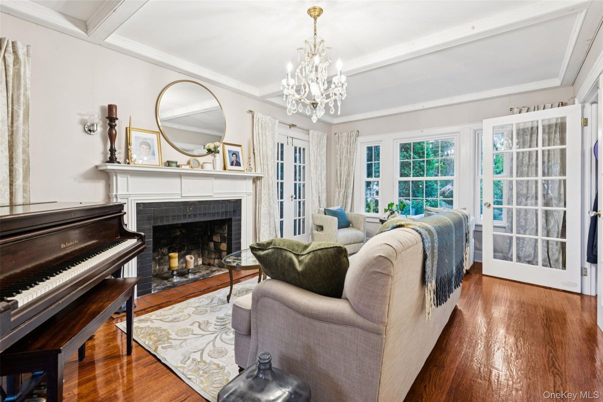 Chandelier, Fireplace, Interior, Living room, Piano, Wood Texture Flooring