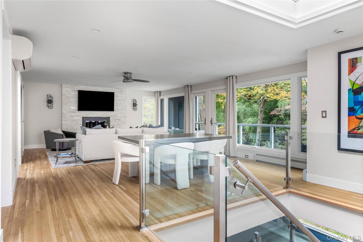 Dining room, Interior, Living room, Recessed Lighting, Stone Walls, Wood Texture Flooring