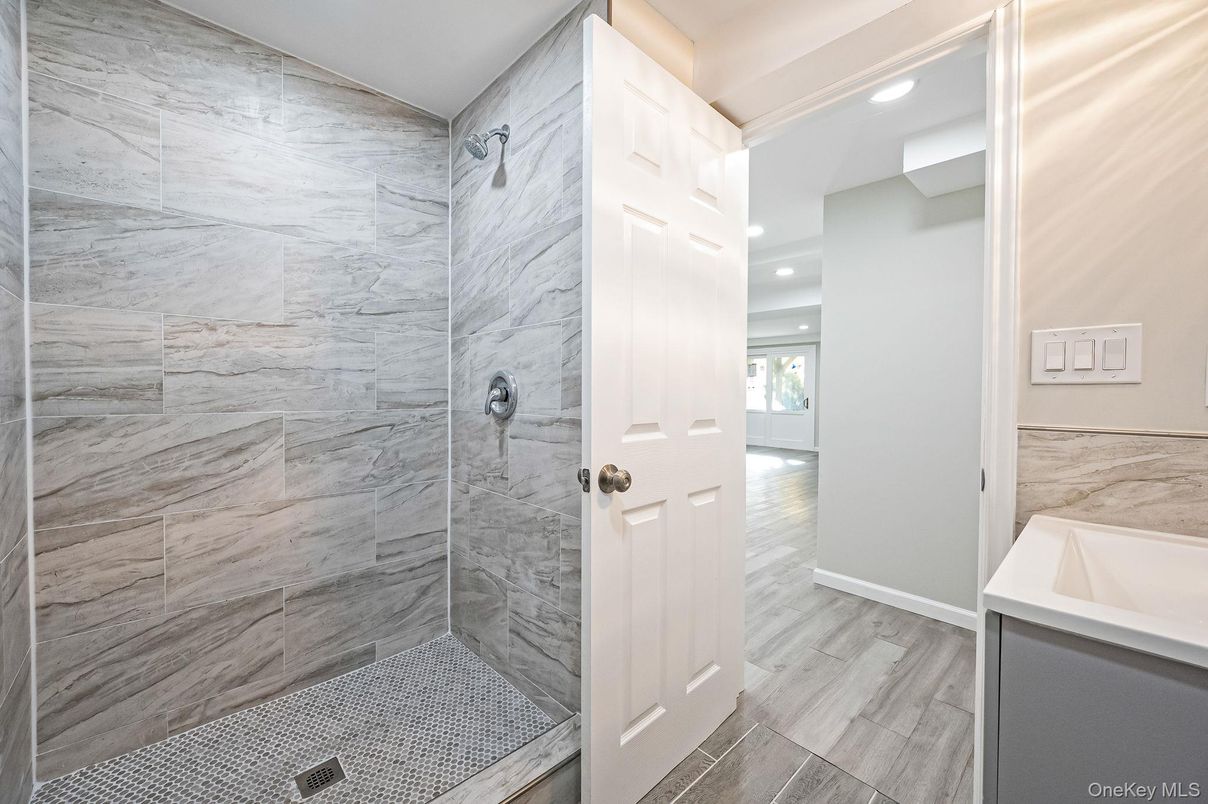 Bathroom, Interior, Marble Walls, Recessed Lighting, Wood Texture Flooring