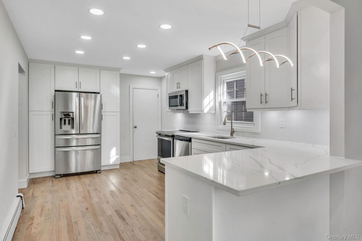 Interior, Kitchen, Pendant Lights, Recessed Lighting, Stainless Steel Appliances, Wood Texture Flooring