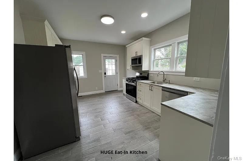 Interior, Kitchen, Recessed Lighting, Stainless Steel Appliances, Wood Texture Flooring