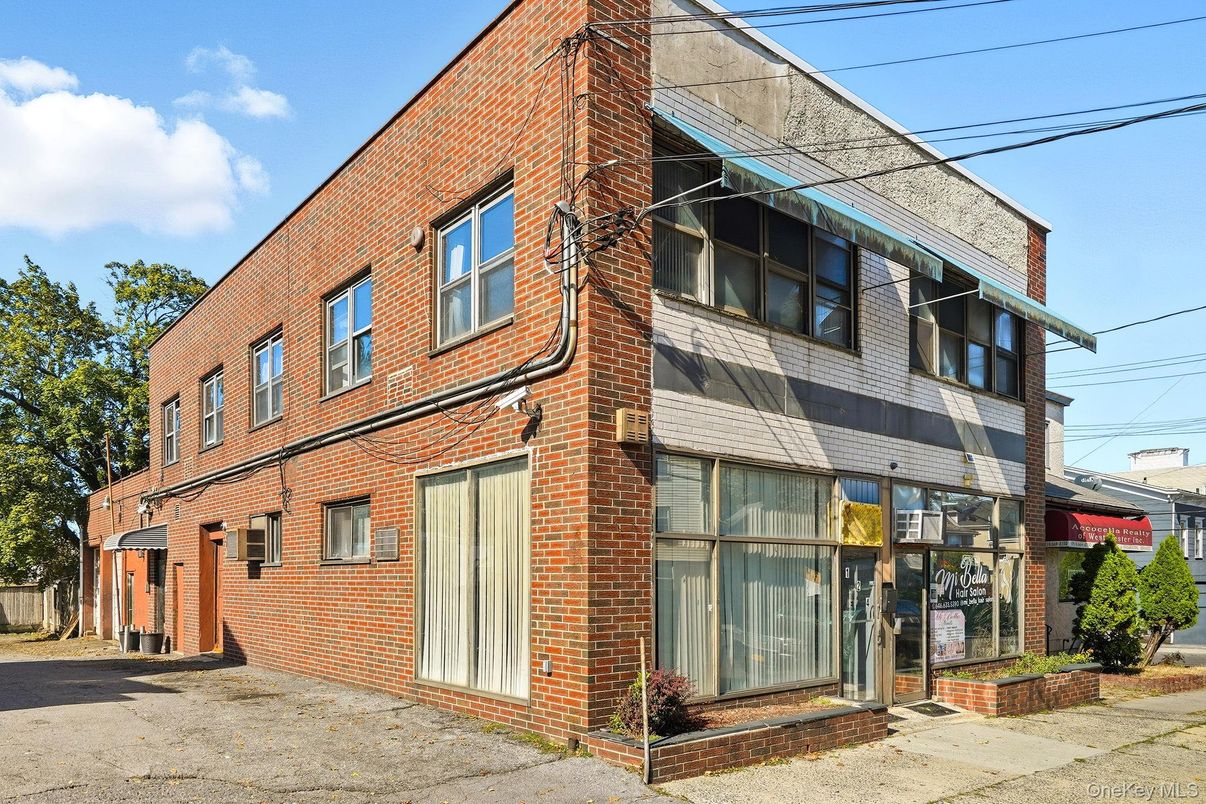 Exterior, Facade, Brick Facade, Condo Building