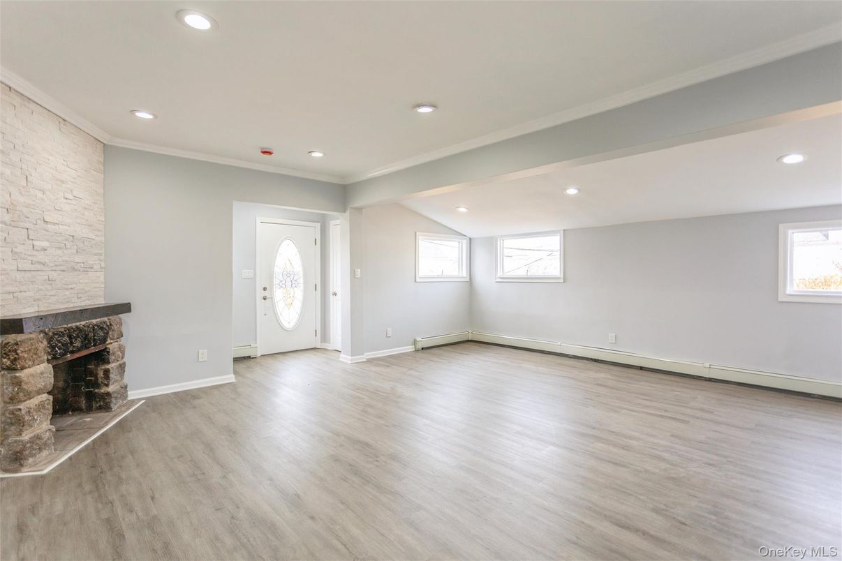Empty room, Fireplace, Interior, Recessed Lighting, Wood Texture Flooring