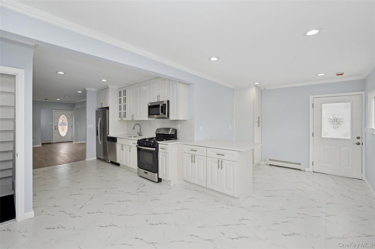 Interior, Kitchen, Marble, Recessed Lighting, Stainless Steel Appliances, Wood Texture Flooring