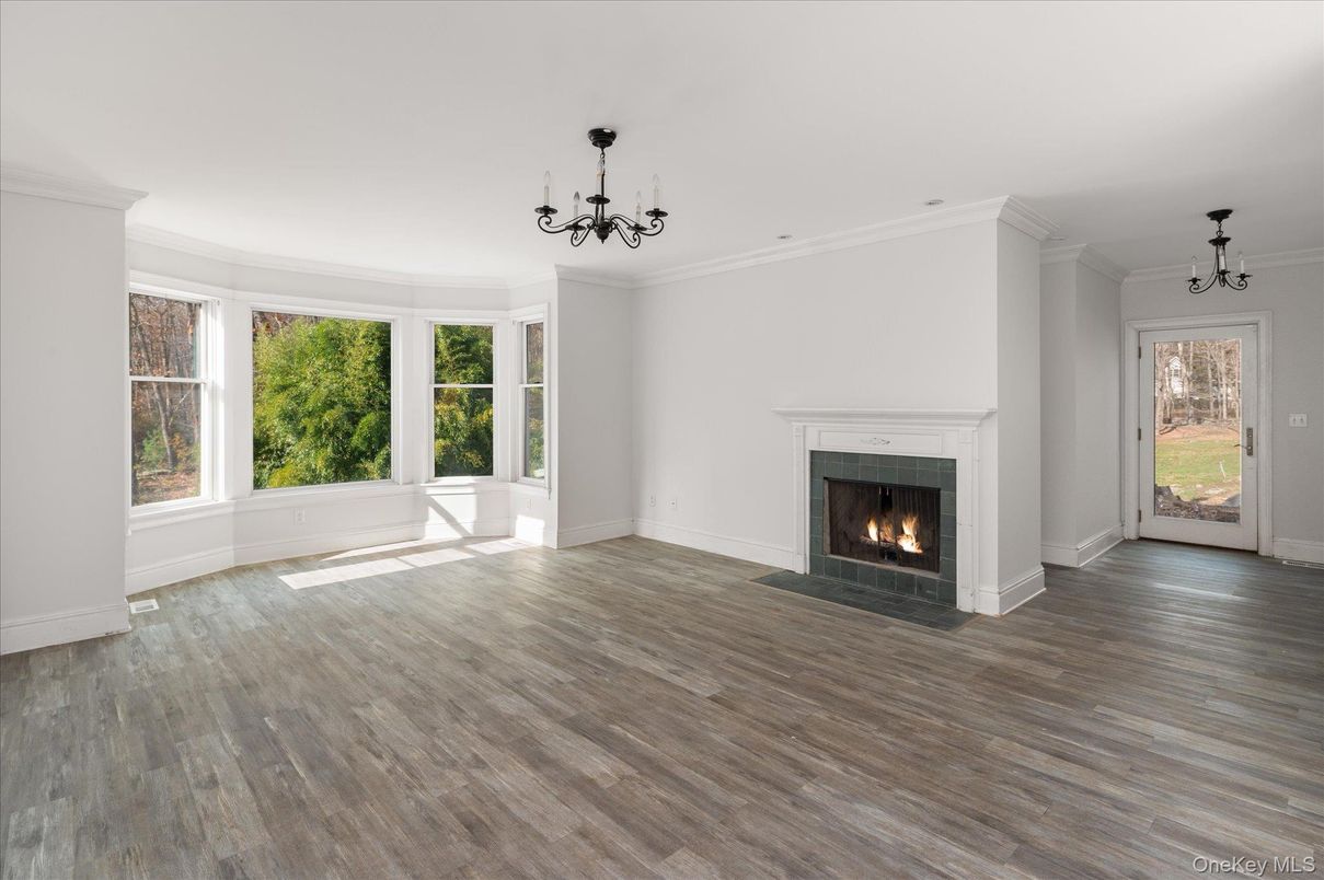 Chandelier, Empty room, Fireplace, Interior, Wood Texture Flooring