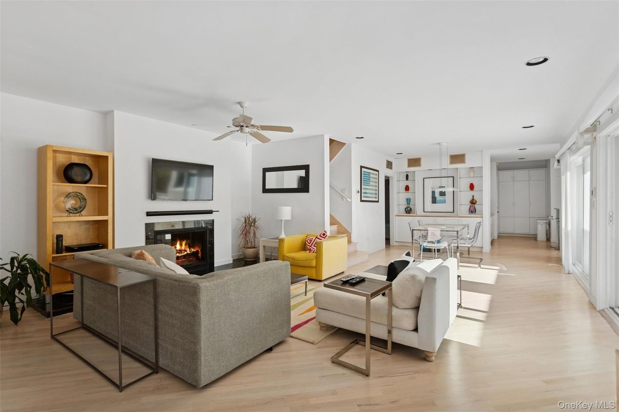 Dining room, Fireplace, Interior, Living room, Pendant Lights, Recessed Lighting, Wood Texture Flooring