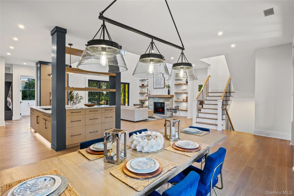 Dining room, Fireplace, Interior, Living room, Pendant Lights, Recessed Lighting, Wood Texture Flooring