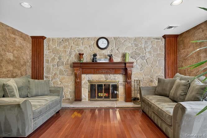 Fireplace, Interior, Recessed Lighting, Stone Walls, Wood Texture Flooring