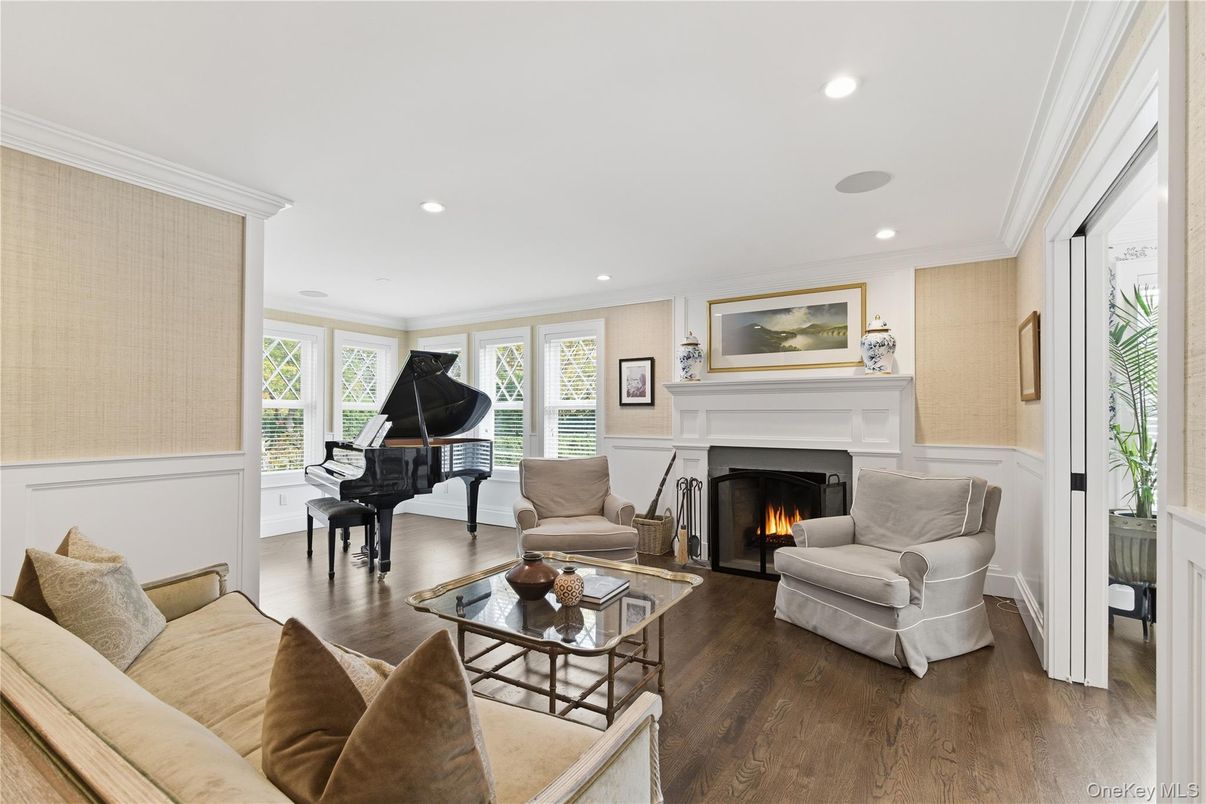 Fireplace, Interior, Living room, Piano, Recessed Lighting, Wood Texture Flooring