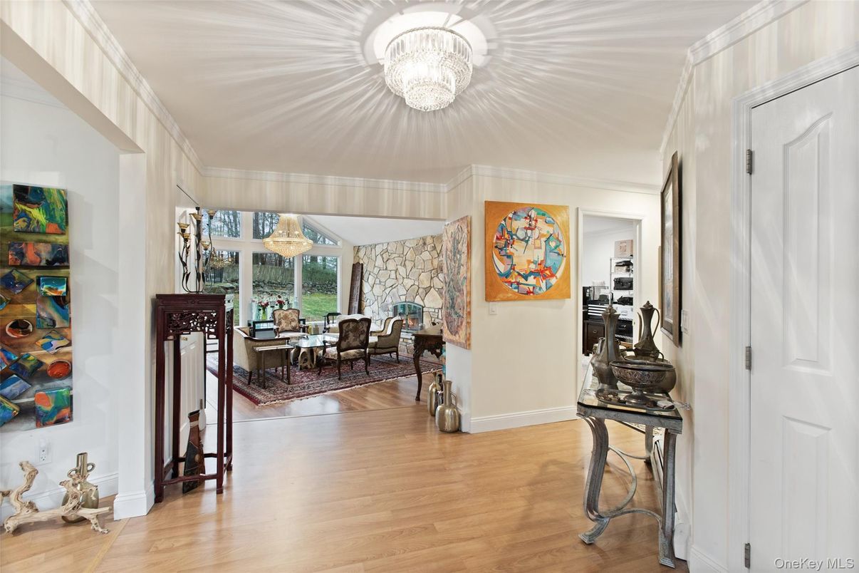 Chandelier, Dining room, Fireplace, Interior, Stone Walls, Wood Texture Flooring