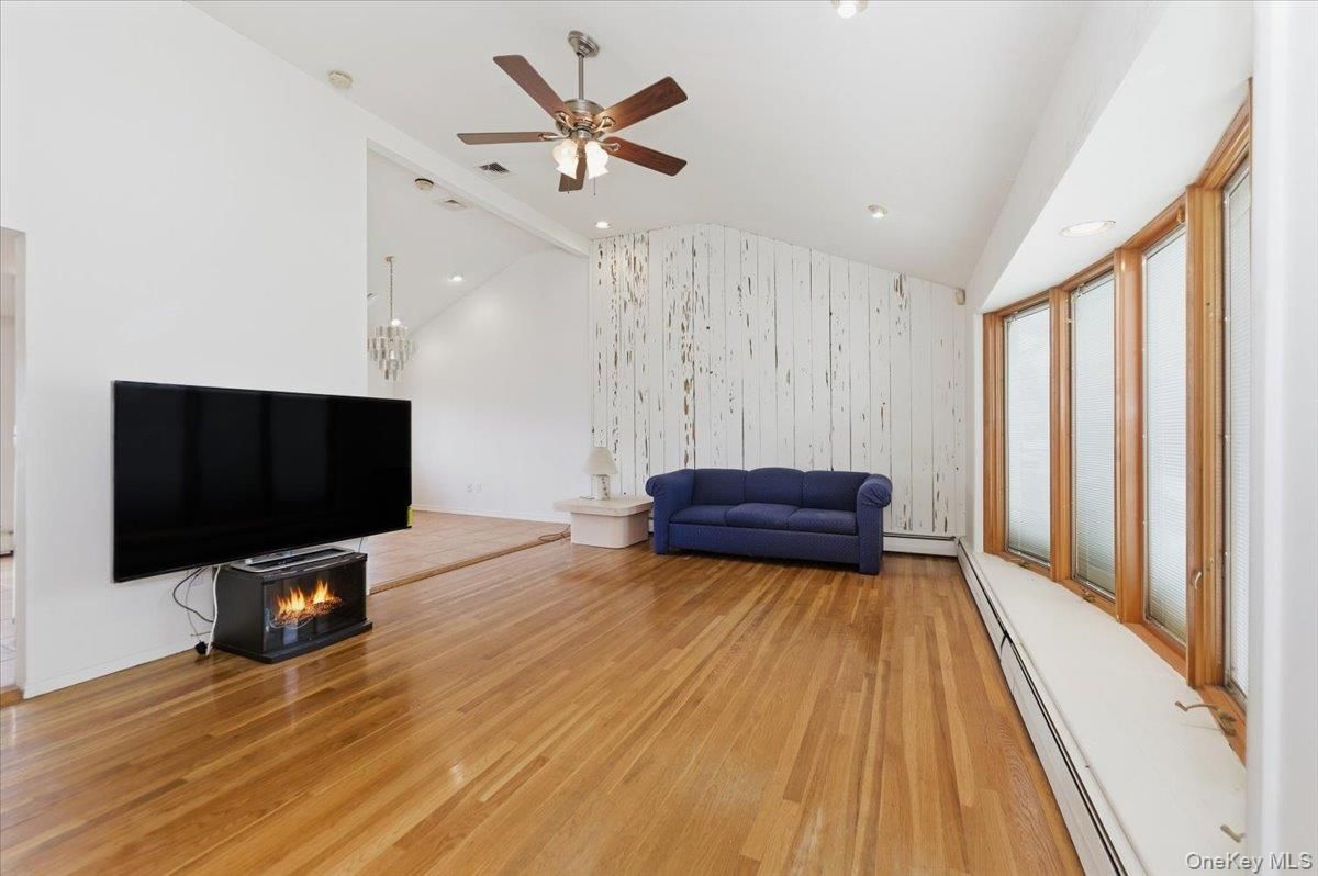 Fireplace, Interior, Pendant Lights, Recessed Lighting, Wood Texture Flooring