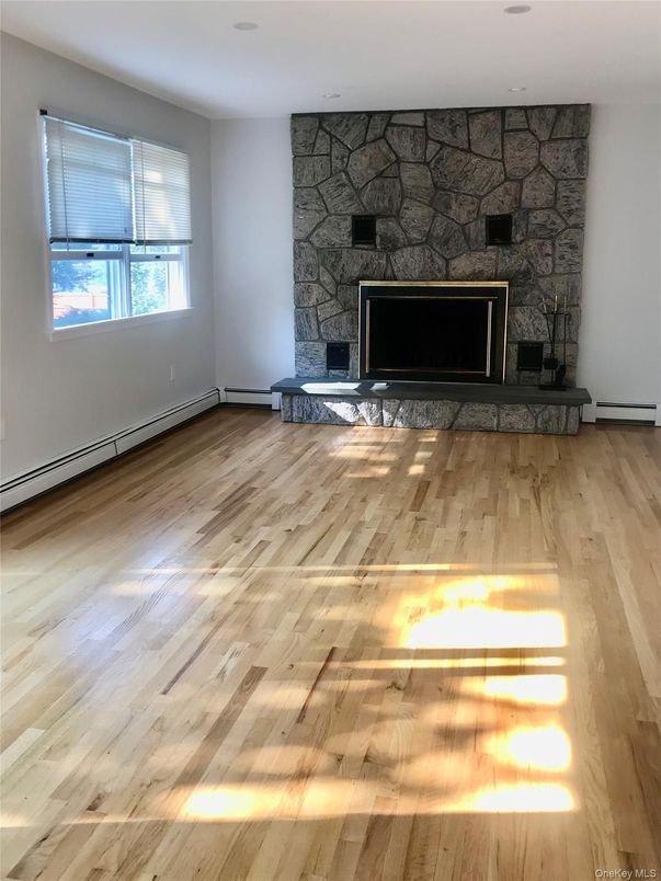 Empty room, Fireplace, Interior, Stone Walls, Wood Texture Flooring